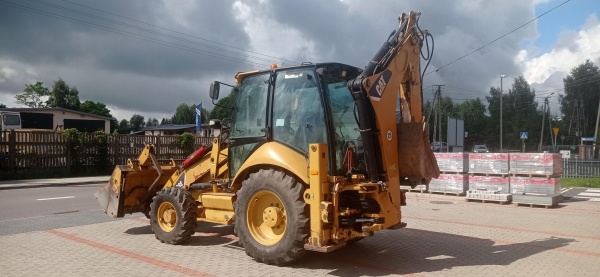 Sprzedaż koparko-ładowarki 428E/Caterpillar